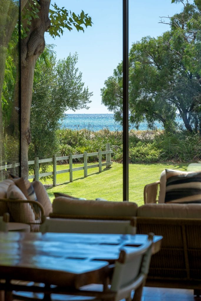 Photo of Flametree interior seating with views of the garden and sea